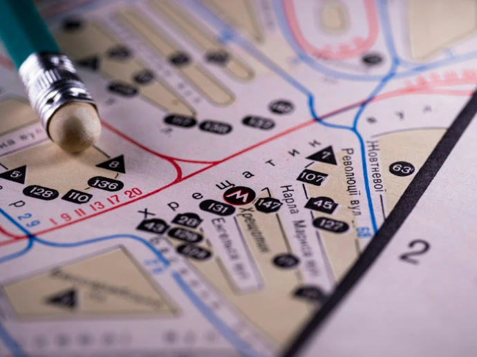 A pencil rests on a map.